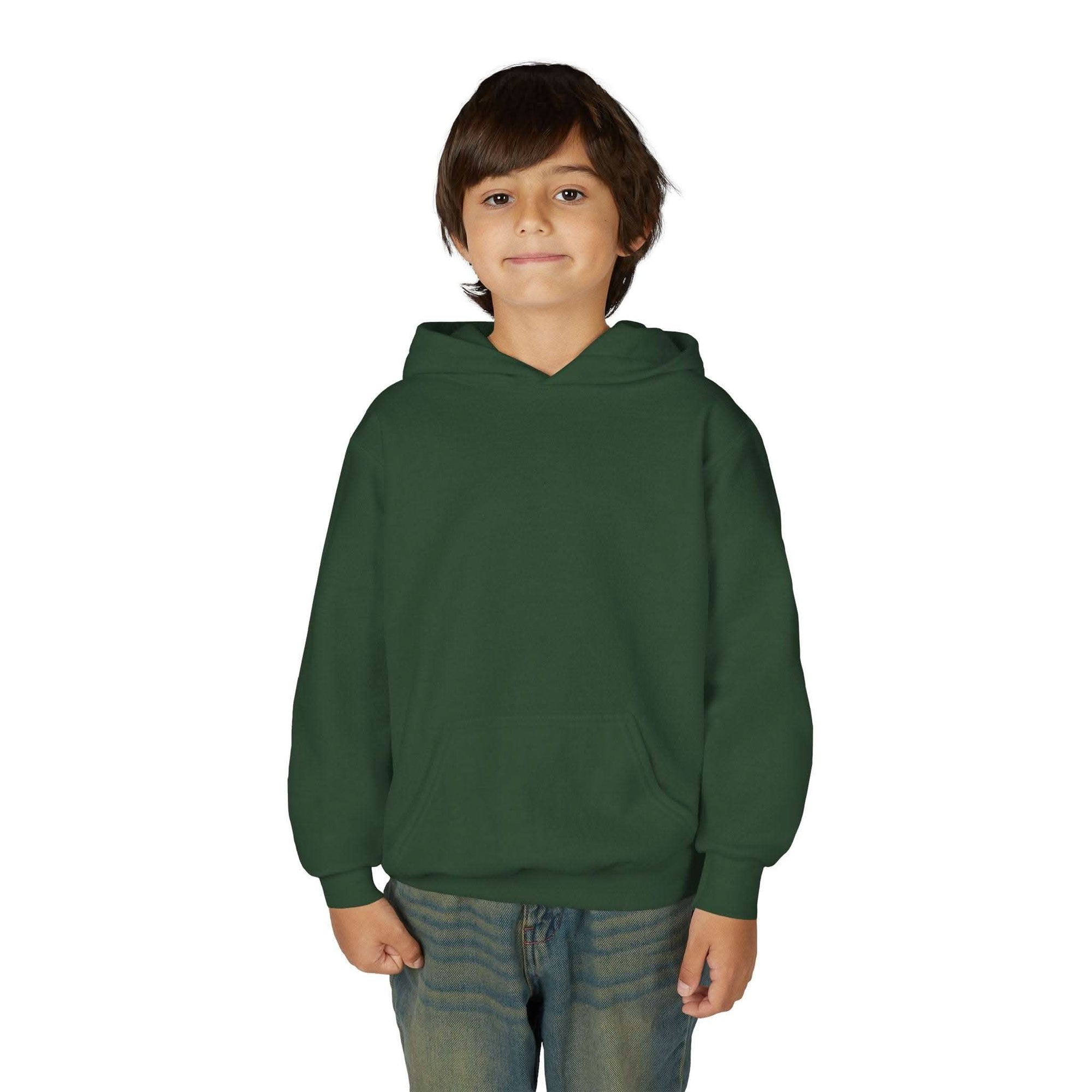 Child wearing navy Surfing Santa Hoodie with Santa surfing on wave graphic on back
