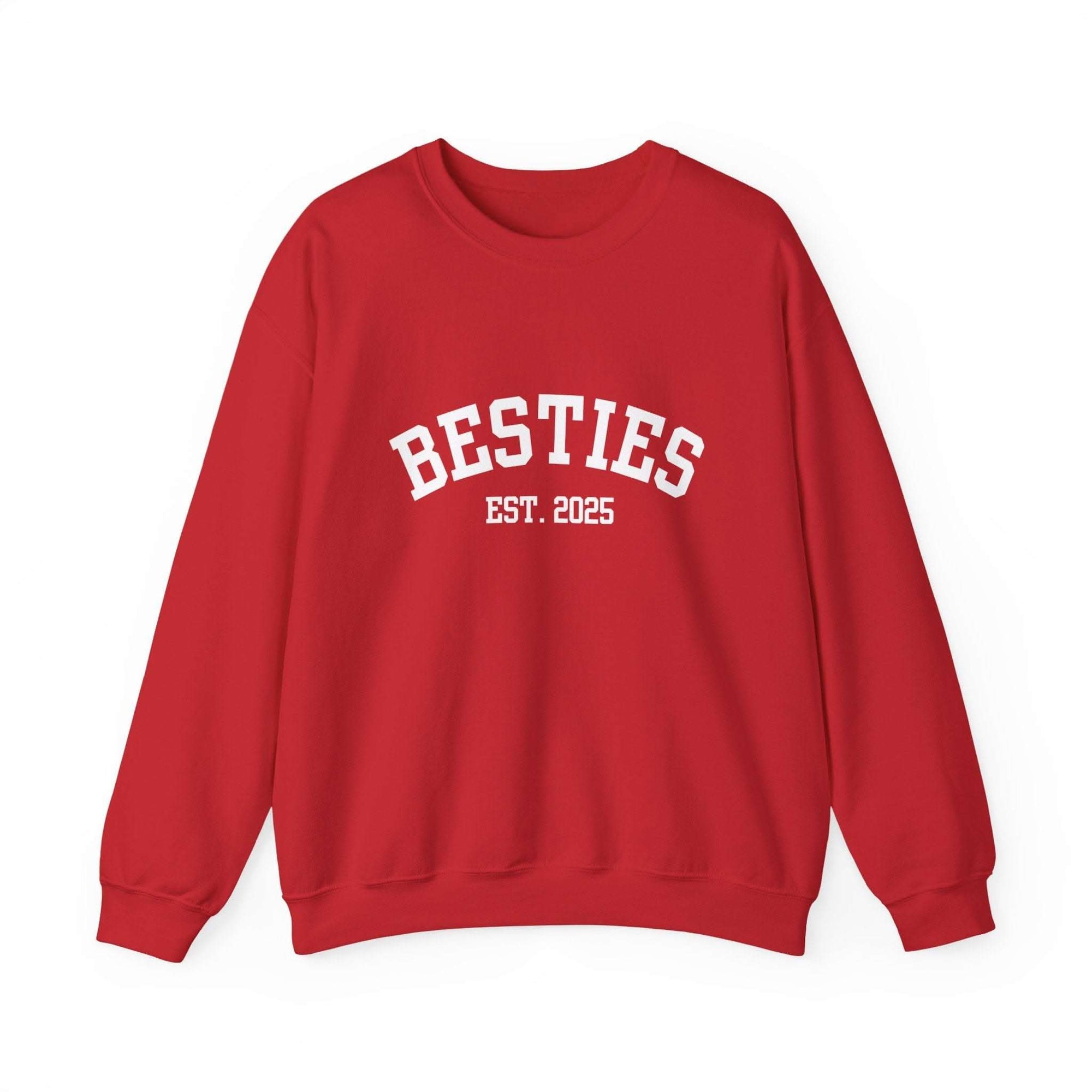 Red sweatshirt with 'BESTIES EST. 2025' text on a white background