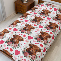 Velveteen plush blanket with floral Valentine design featuring a Highland cow on soft fabric