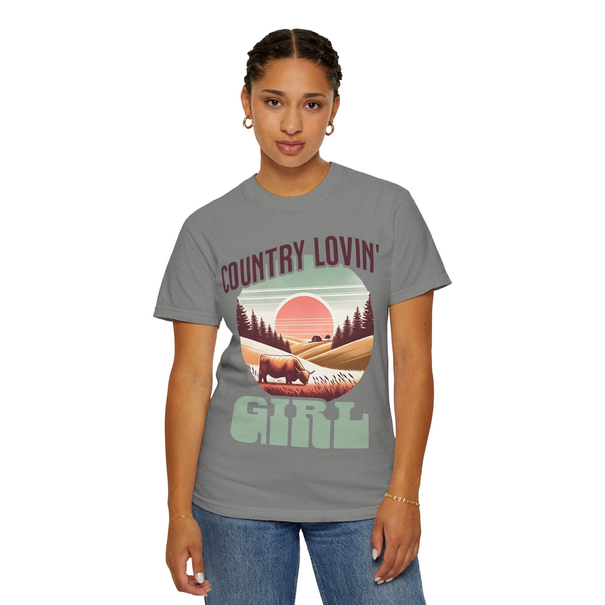 Woman wearing a gray Country Lovin Girl T-shirt with vintage country landscape design