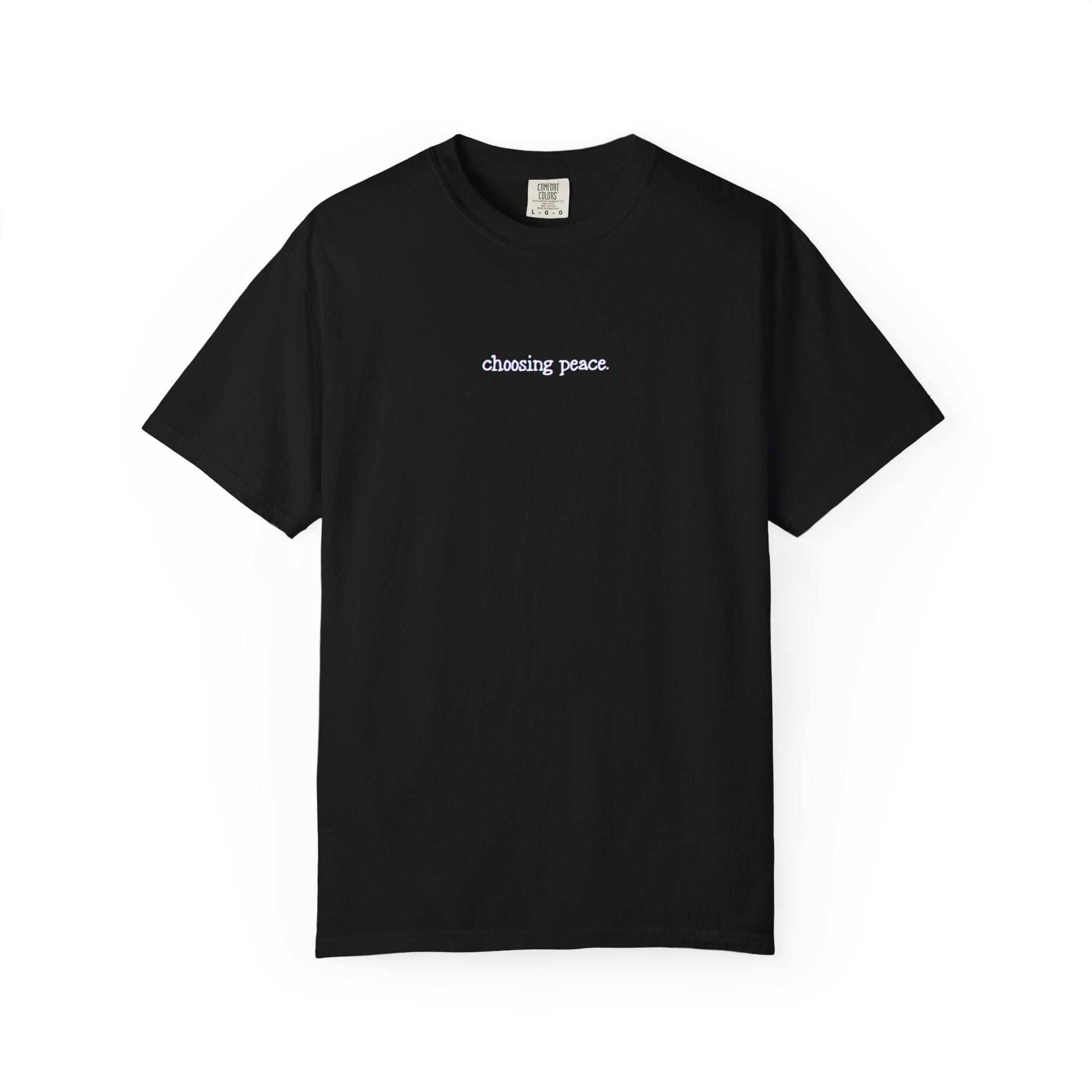 Black t-shirt with 'choosing peace' text on a white background