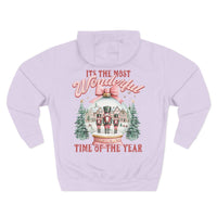Preppy pink fleece hoodie with snow globe and nutcracker design for holiday comfort