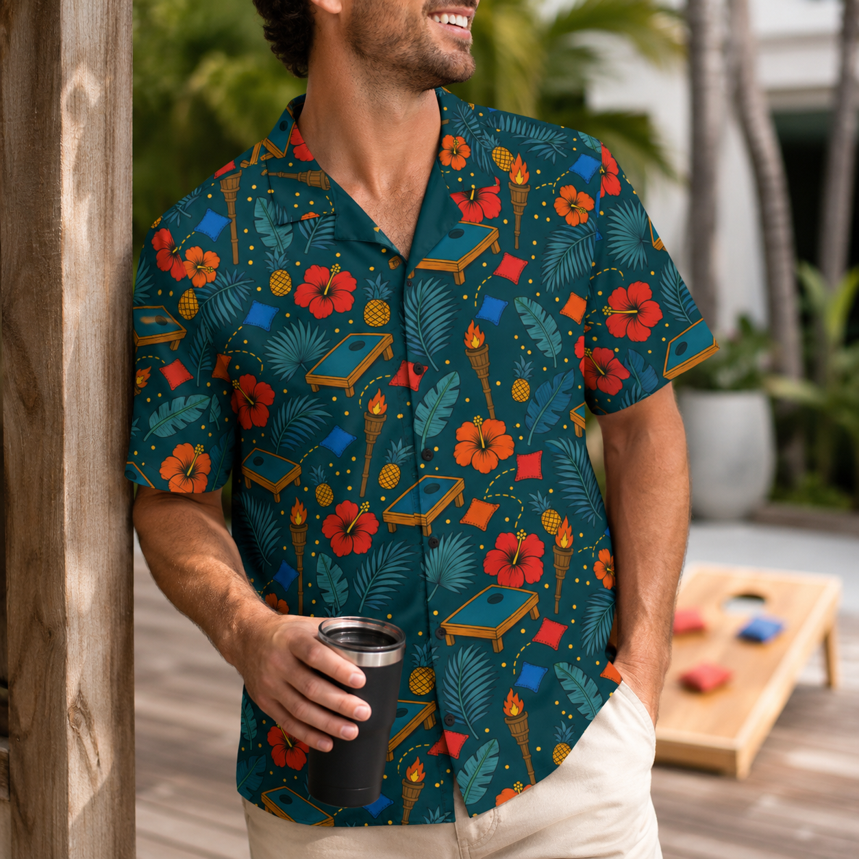 Cornhole Hawaiian shirt with tropical bean bags, boards, tiki torches, and hibiscus on teal background, unisex UPF 50+ button-up