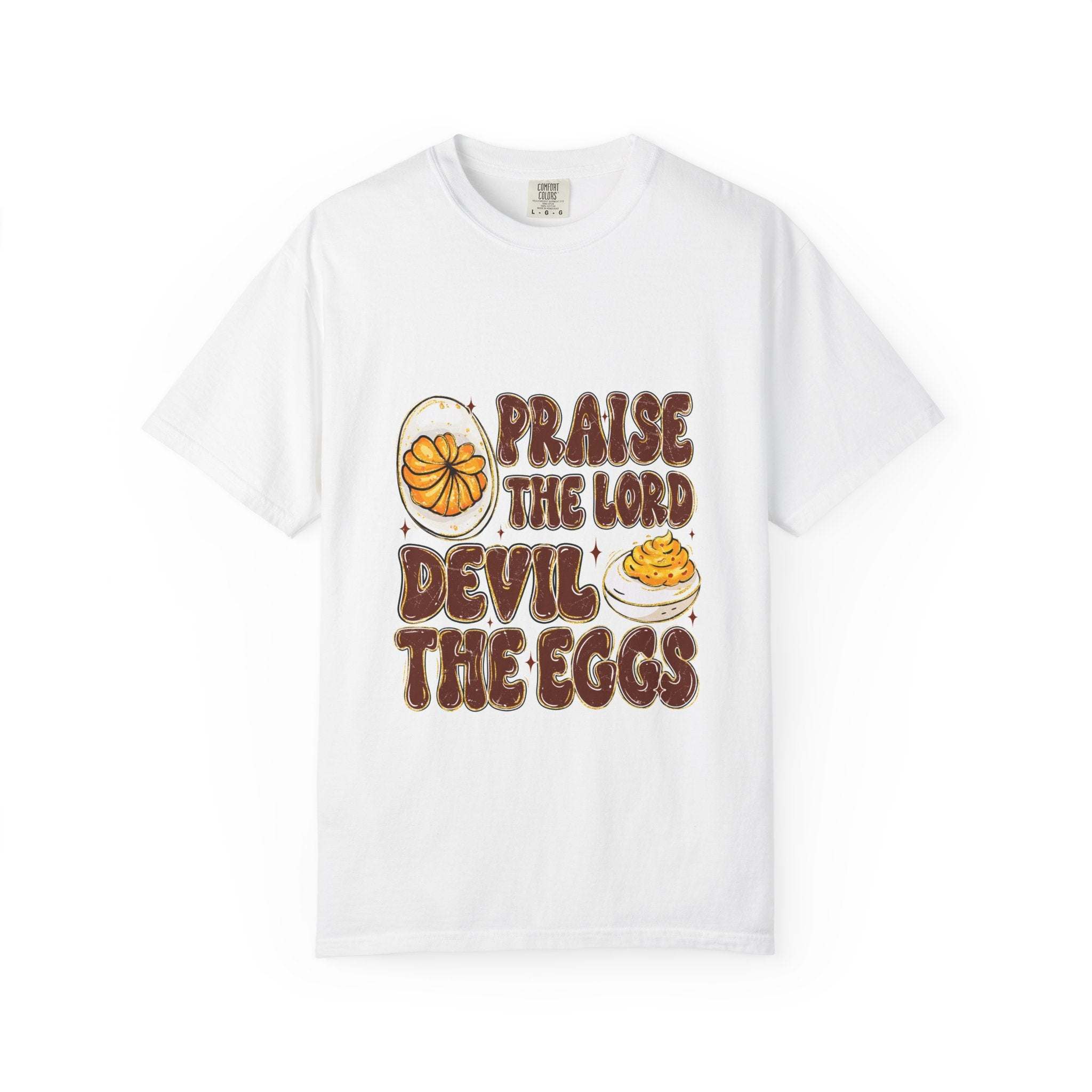 White cotton t-shirt featuring 'Praise the Lord, Devil the Eggs' design, perfect for Easter and Christian apparel.
