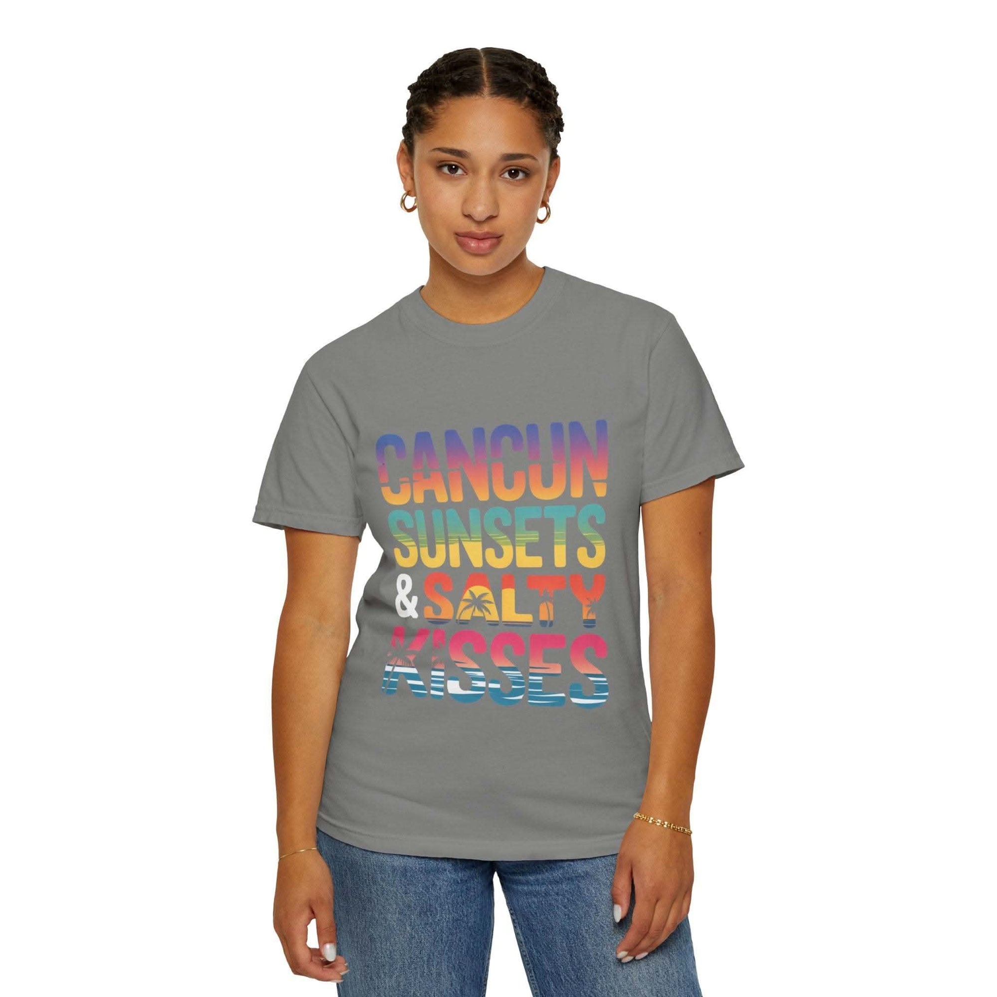 Person wearing a gray t-shirt with colorful text design on a white background