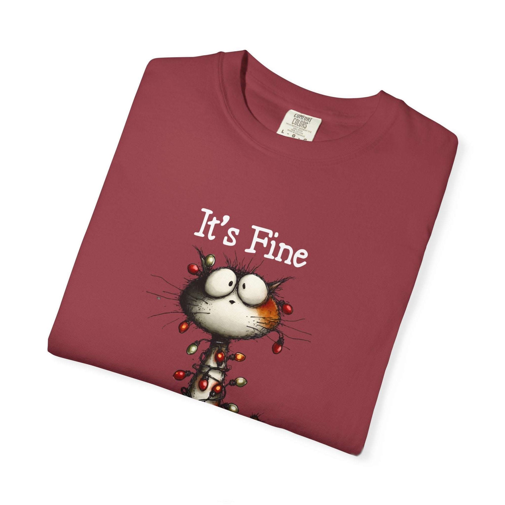 Garment-dyed cotton cat t-shirt with "It’s Fine" text and small cat illustration in relaxed fit