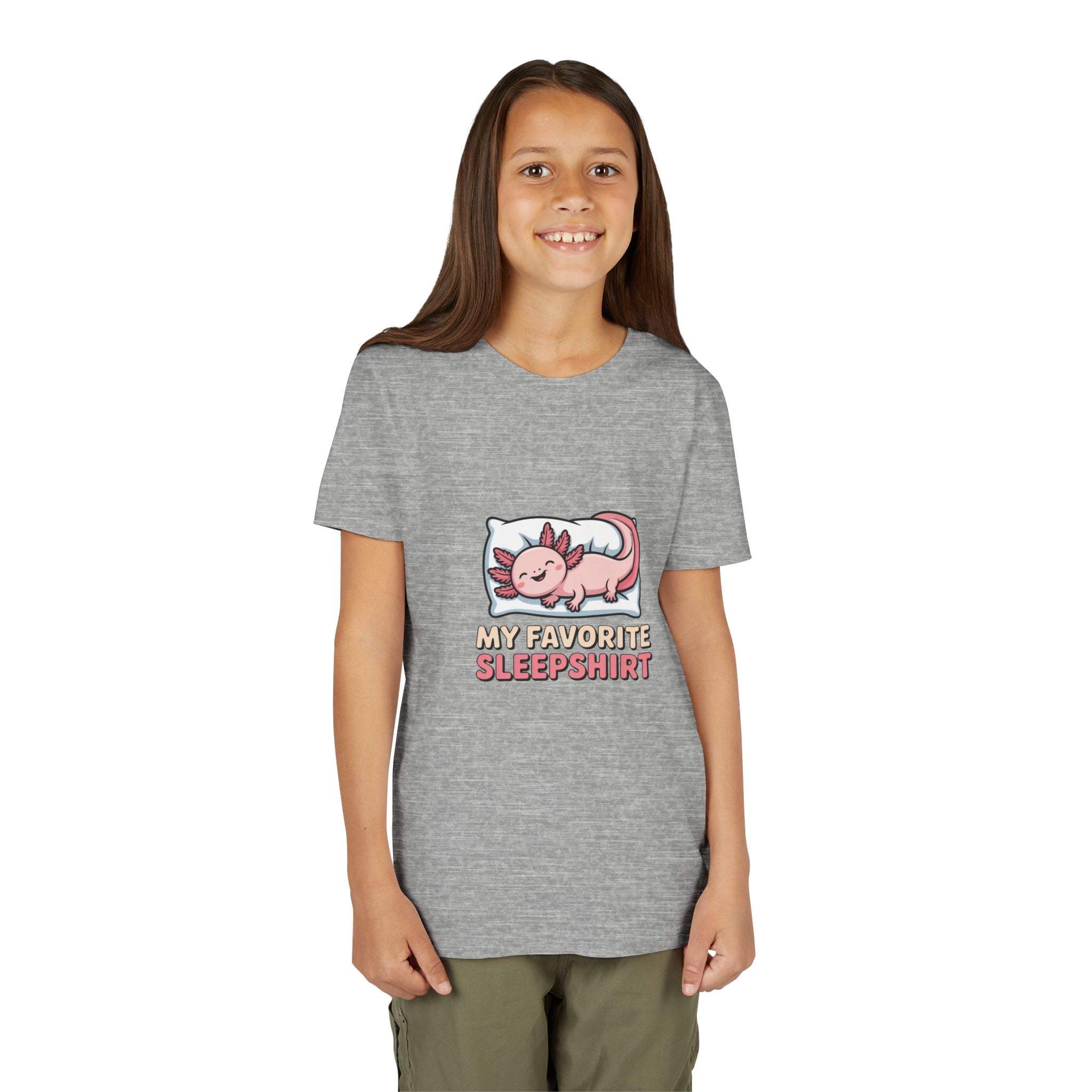 Girl wearing a gray t-shirt with a cartoon dragon design and text on a white background