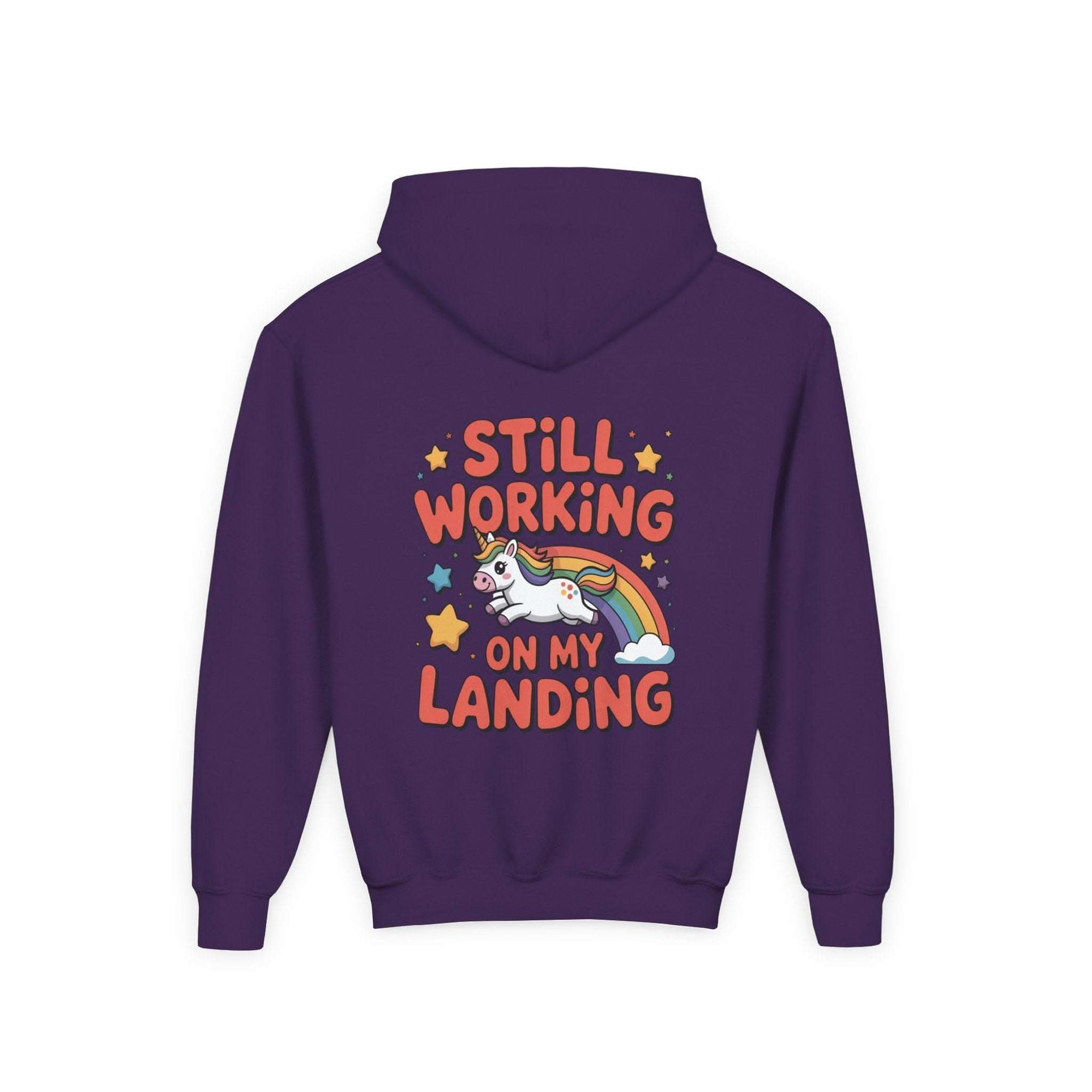 Kids hoodie with colorful unicorn and rainbow design, "Still Working On My Landing" text, cozy kangaroo pocket, durable fabric for active kids