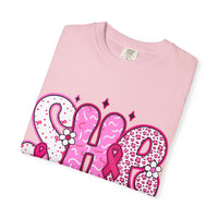 Folded pink Fighter Breast Cancer T-shirt with bold patterned text and ribbon graphics on front