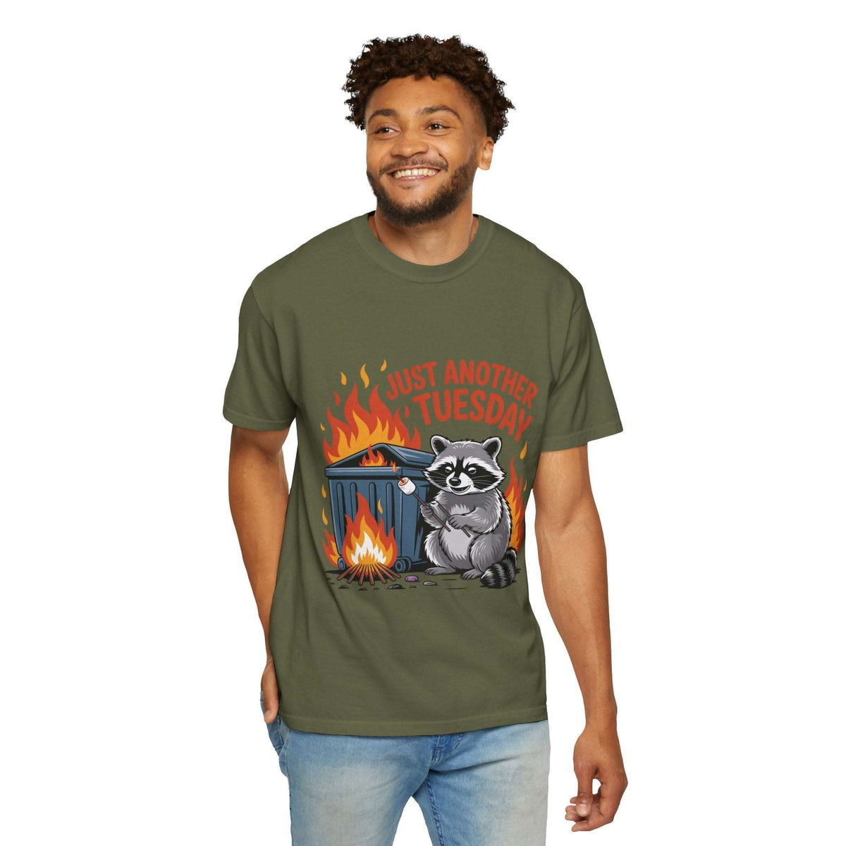 Man wearing a green t-shirt with a raccoon graphic and text on a white background