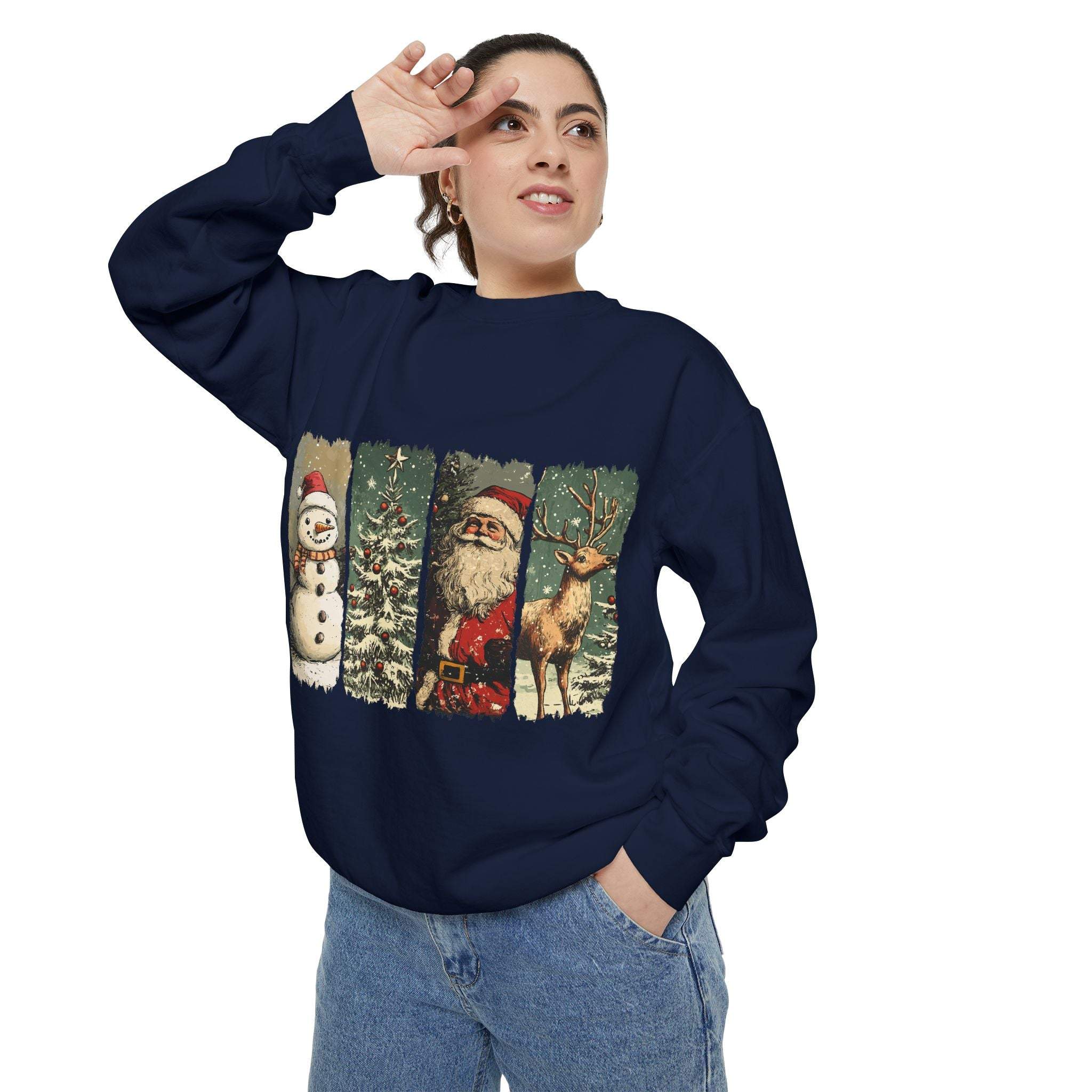 Woman wearing vintage Christmas sweatshirt with watercolor holiday swatches of snowman, tree, Santa, and reindeer on navy background