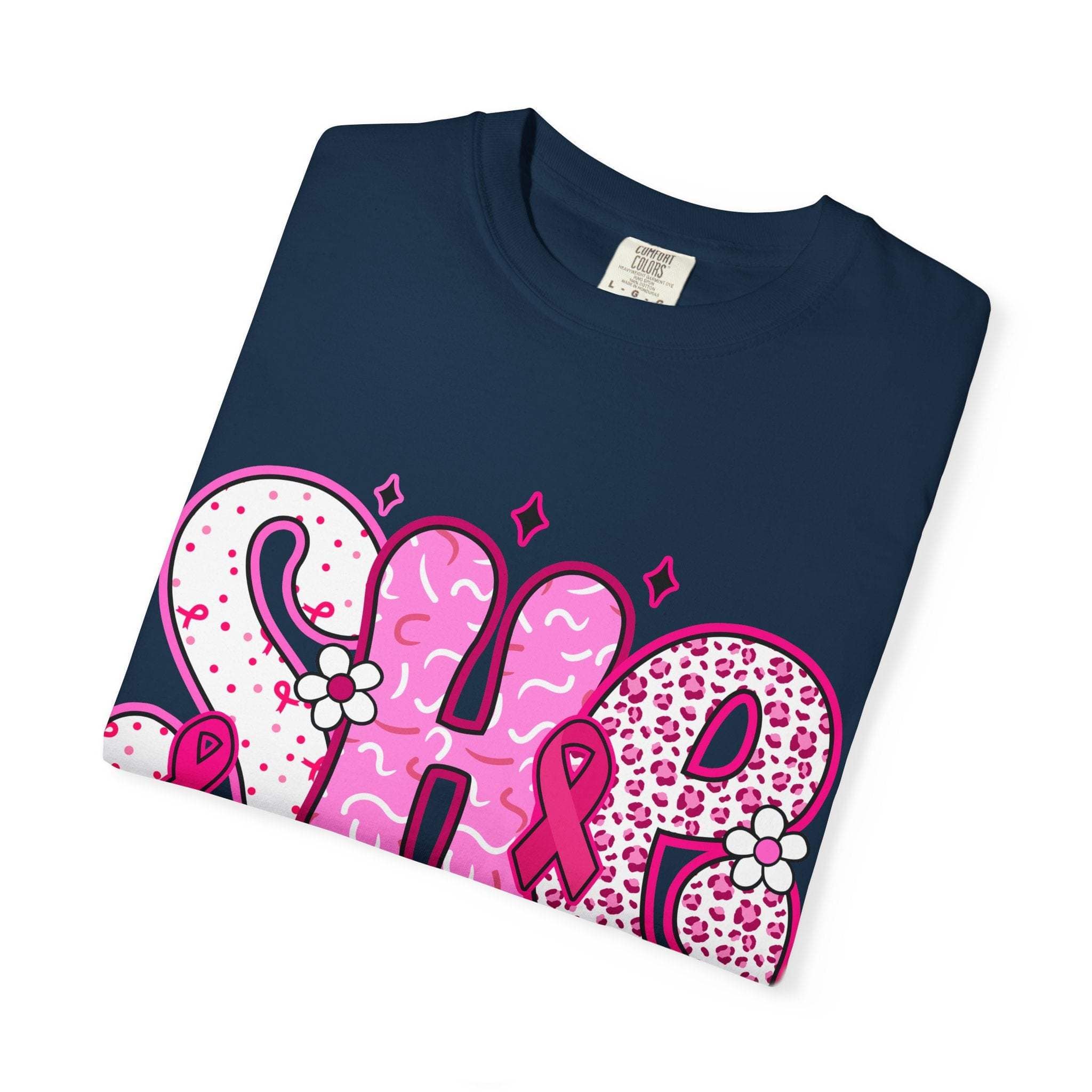 Folded navy blue Fighter Breast Cancer T-shirt with pink awareness ribbon and decorative text design