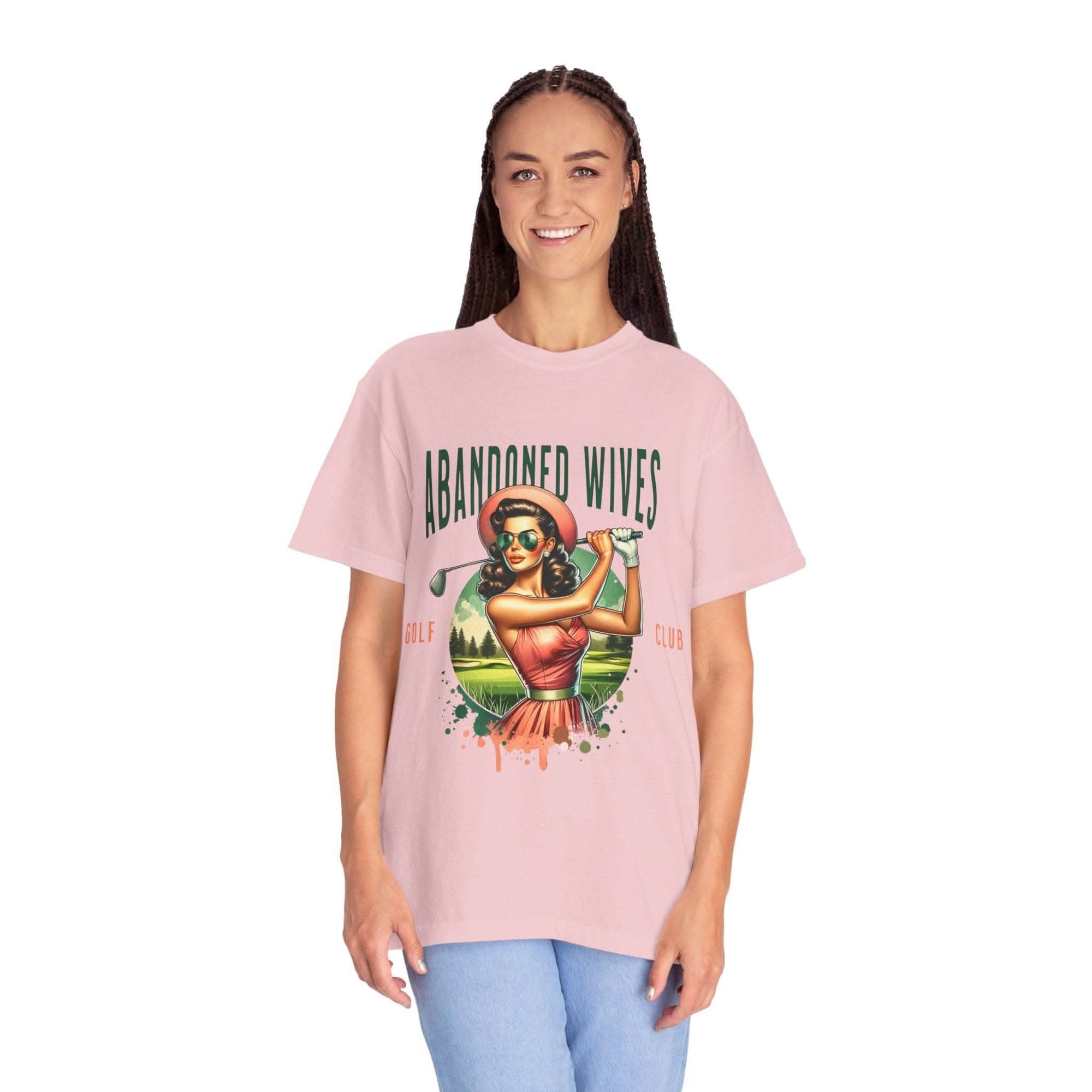 Vintage unisex T-shirt with Abandoned Wives Golf Club retro design, pink color, casual fit.