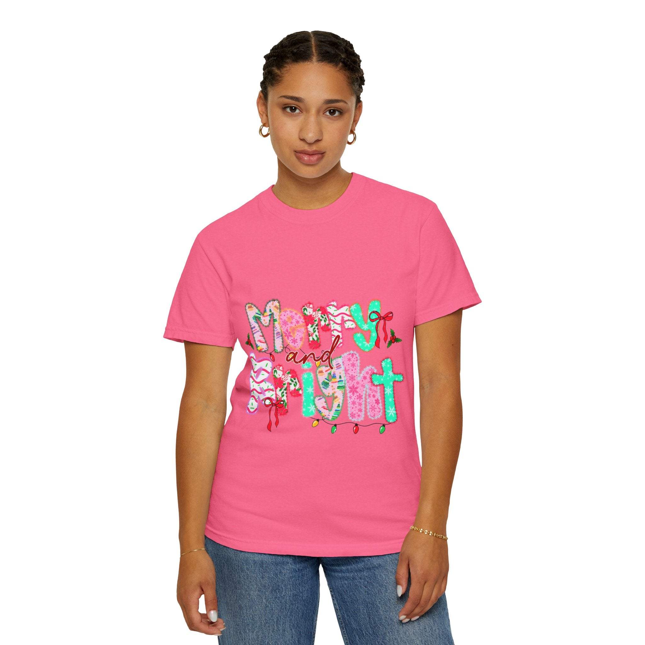Woman wearing pink Merry and Bright T-shirt with festive holiday design