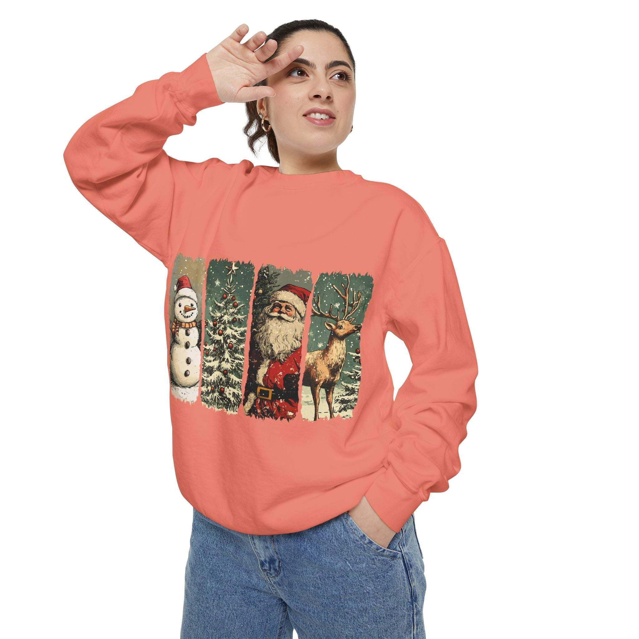 Vintage Christmas sweatshirt with watercolor Santa, snowman, and reindeer design on coral background