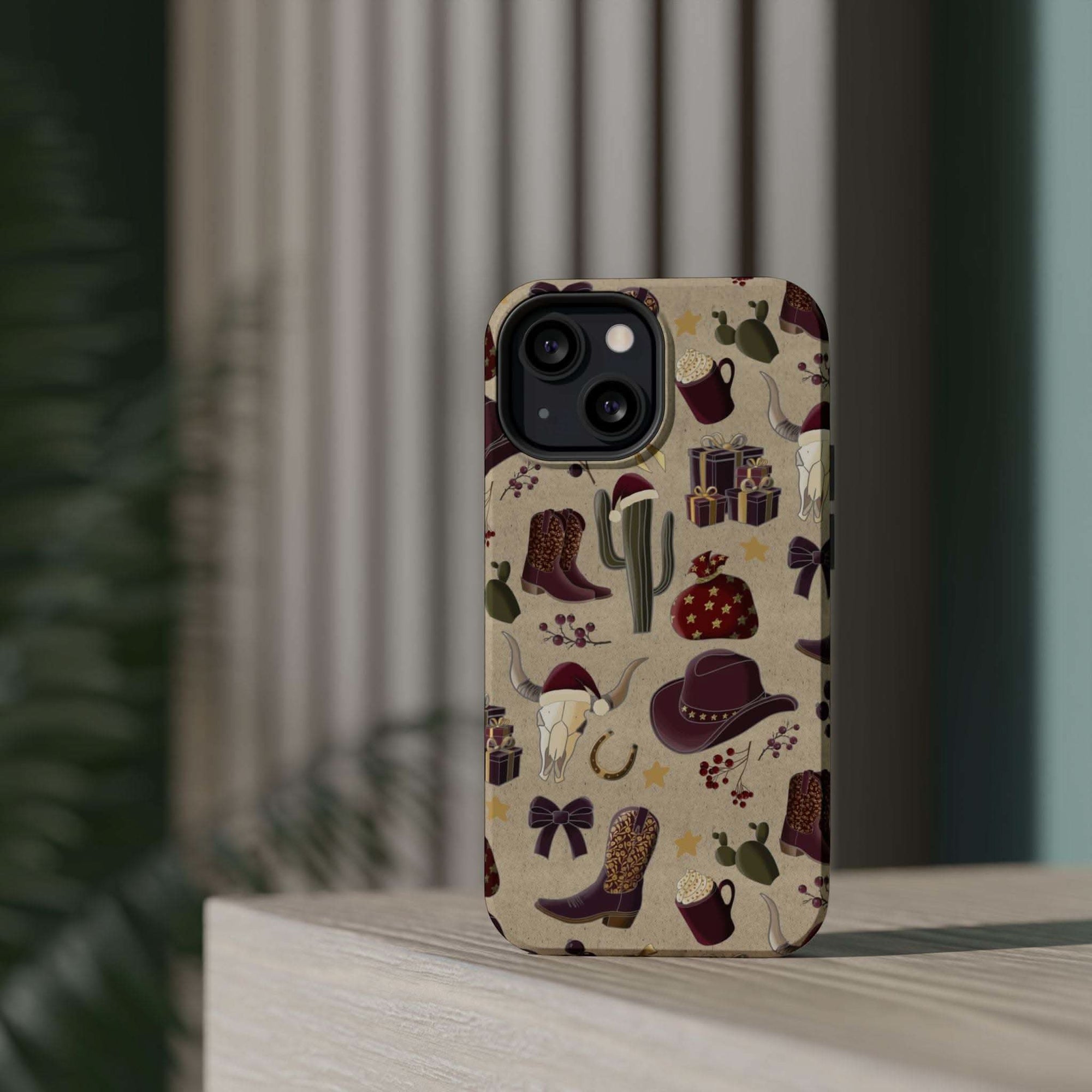 Cowboy Christmas design phone case for iPhone 17 in glossy finish by Printify, featuring festive colors and patterns.