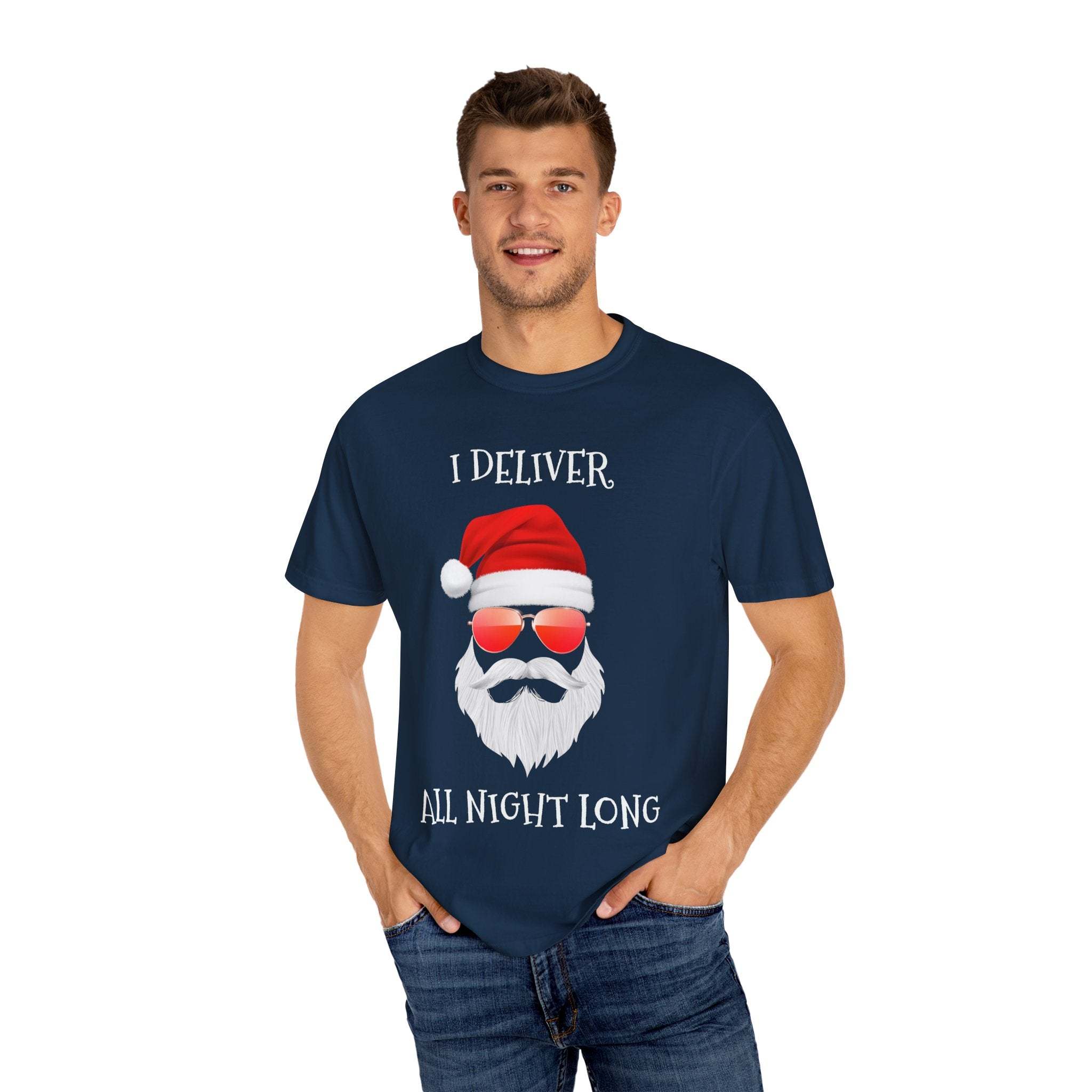 Man wearing navy Santa I Deliver All Night Long Christmas themed T-shirt with Santa face and red sunglasses design