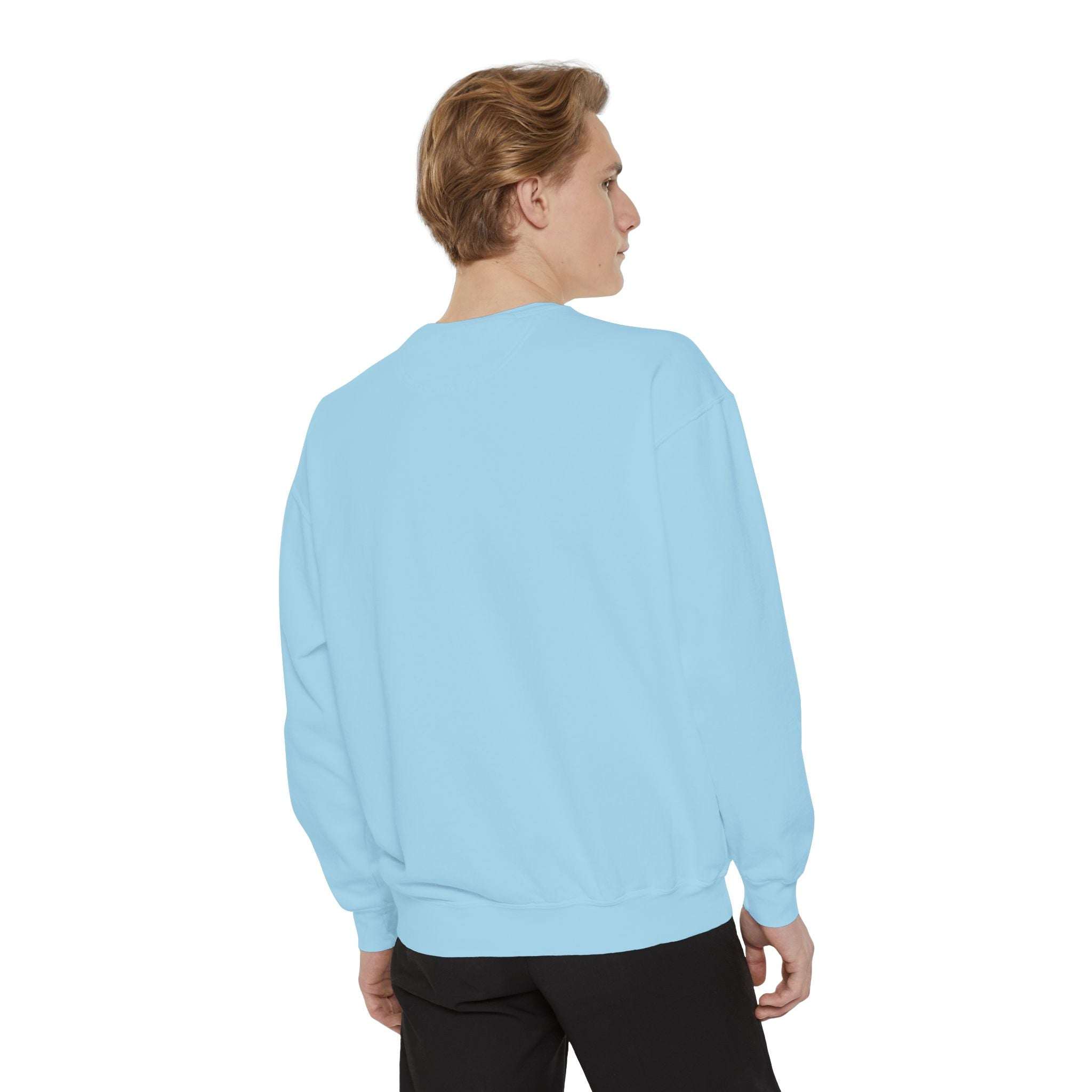 Back view of man wearing light blue Vintage North Pole Book Club sweatshirt with ribbed collar, cuffs, and hem, made from cotton-polyester blend