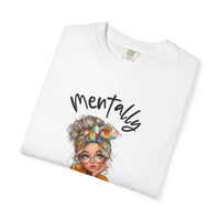 White t-shirt with a graphic of a woman with flowers in her hair and the word 'Mentally' on a white background.