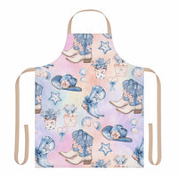 Pastel Coastal Cowgirl apron with colorful boots, hats, and floral designs on soft polyester canvas with tie-back straps
