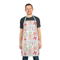 Man wearing Retro Christmas Frames apron with festive candy and bow designs and blue straps