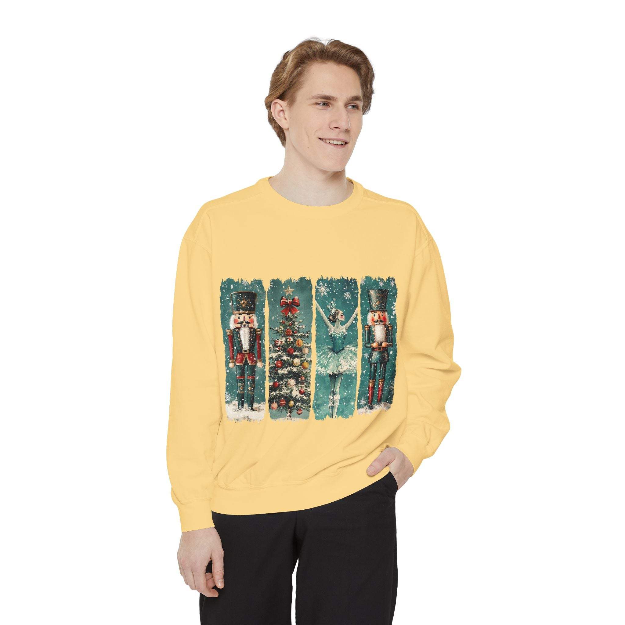 Man wearing yellow vintage Christmas Nutcracker sweatshirt with nutcracker and tree design
