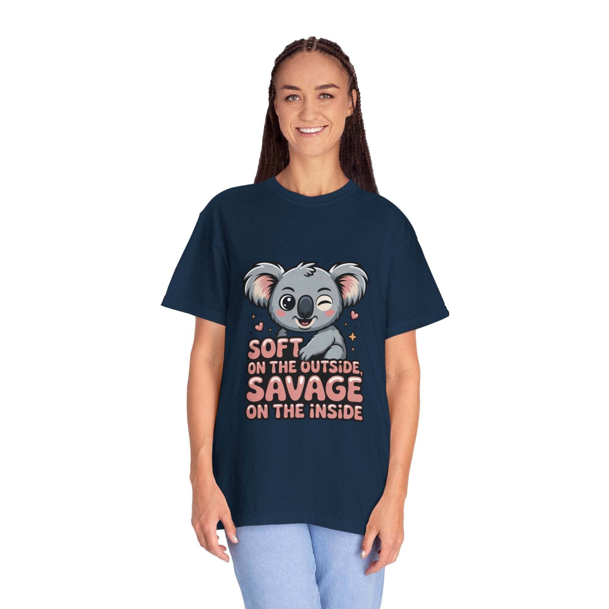 Woman wearing navy blue t-shirt with playful koala graphic and "Soft on the Outside, Savage on the Inside" text