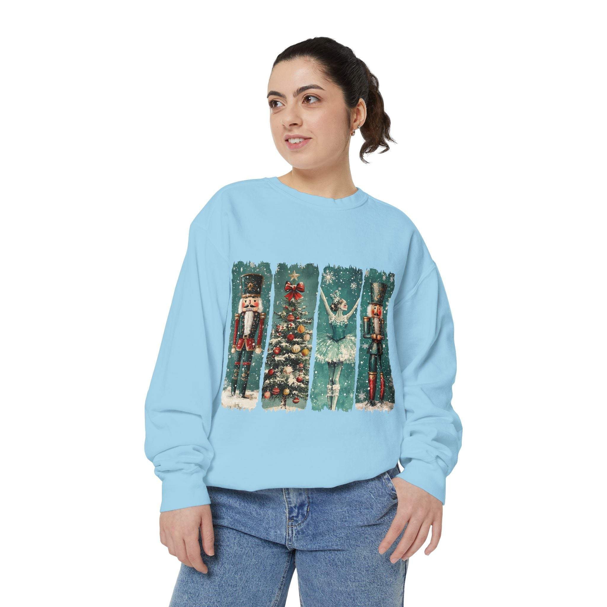 Woman wearing vintage Christmas Nutcracker sweatshirt with holiday watercolor design and ribbed cuffs