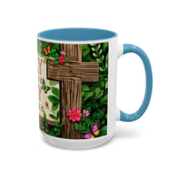 Mug with a cross and floral design on a white background