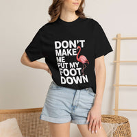Dont Make Me Put My Foot Down flamingo graphic T-shirt with bold white text on vintage garment-dyed cotton
