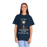 Woman wearing navy cat t-shirt with "It's Fine I'm Fine Everything's Fine" text and cat illustration