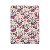 Soft fleece blanket with floral pelican design and plush Sherpa lining for cozy coastal comfort