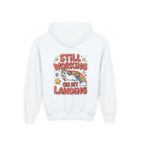 Kids unicorn rainbow design hoodie with playful unicorn and rainbow print on white fabric