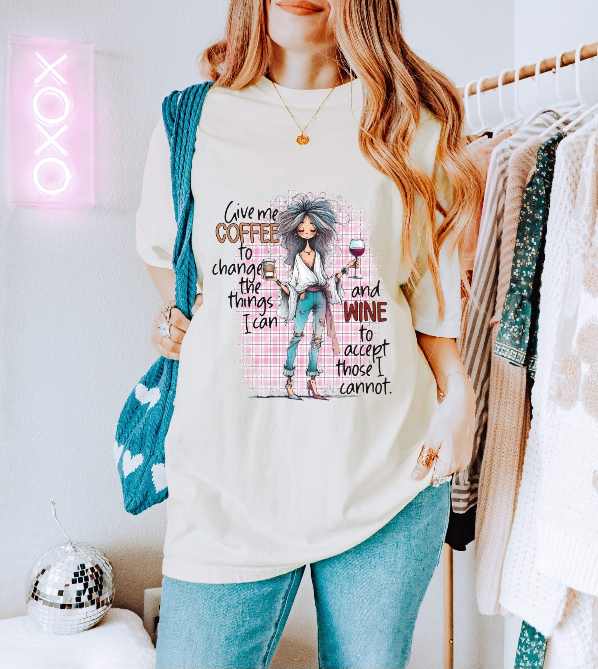 Woman wearing Coffee and Wine Unisex T-shirt with quote about coffee and wine, casual outfit