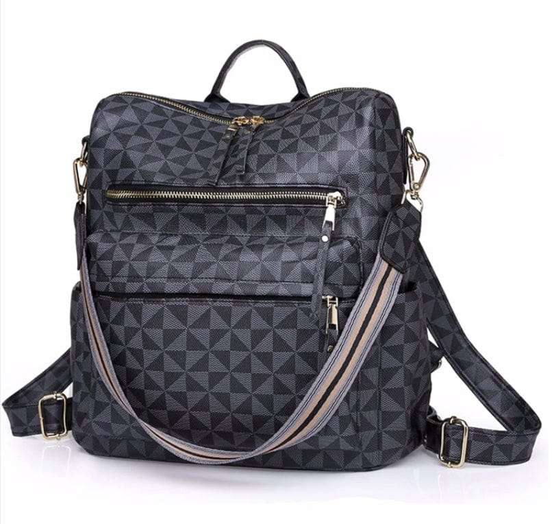Stylish women's university shoulder bag made of high-quality synthetic leather with removable strap and spacious design