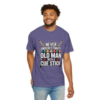Man wearing a purple t-shirt with humorous text and graphics on a white background