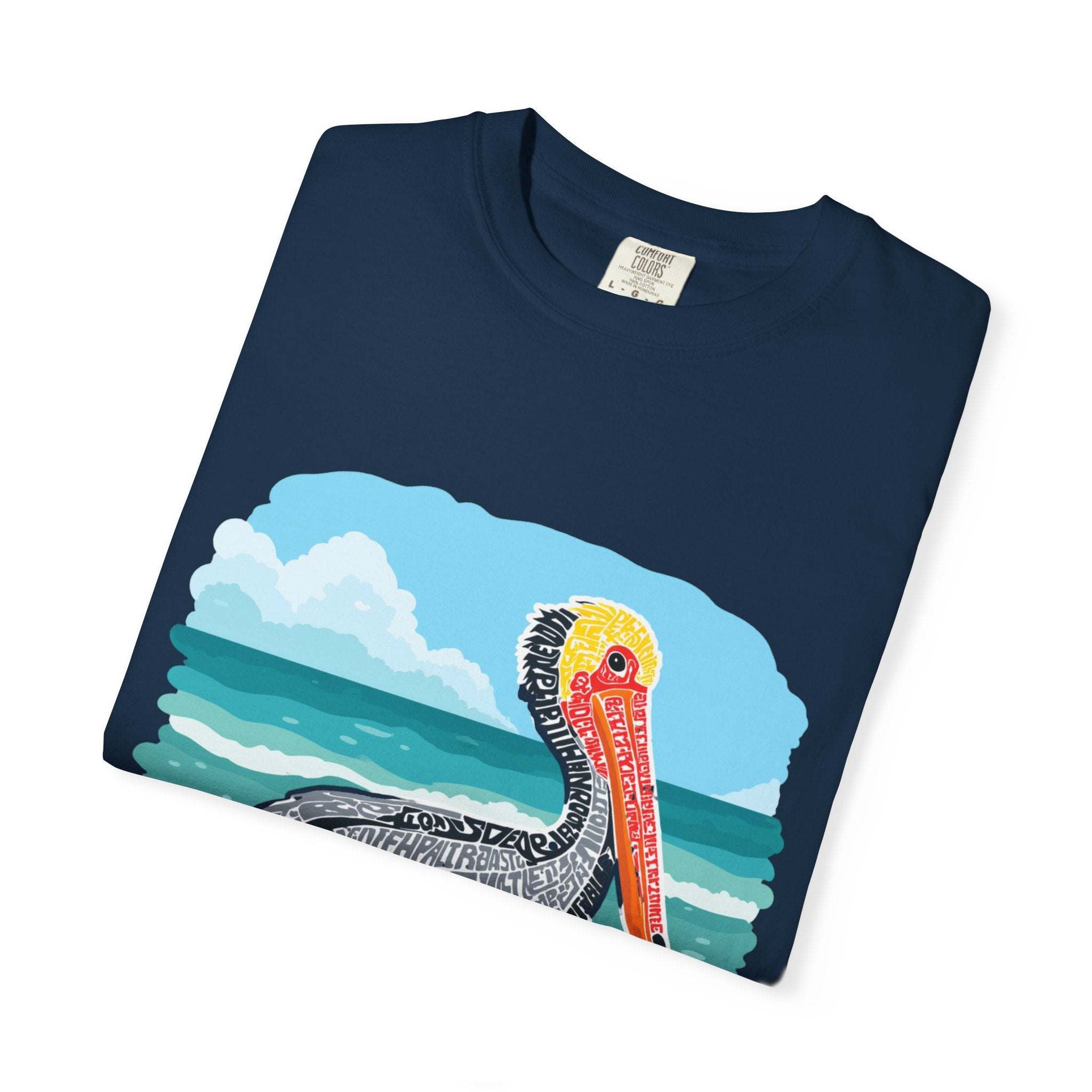 Navy vintage coastal t-shirt with pelican letter poster graphic and ocean background