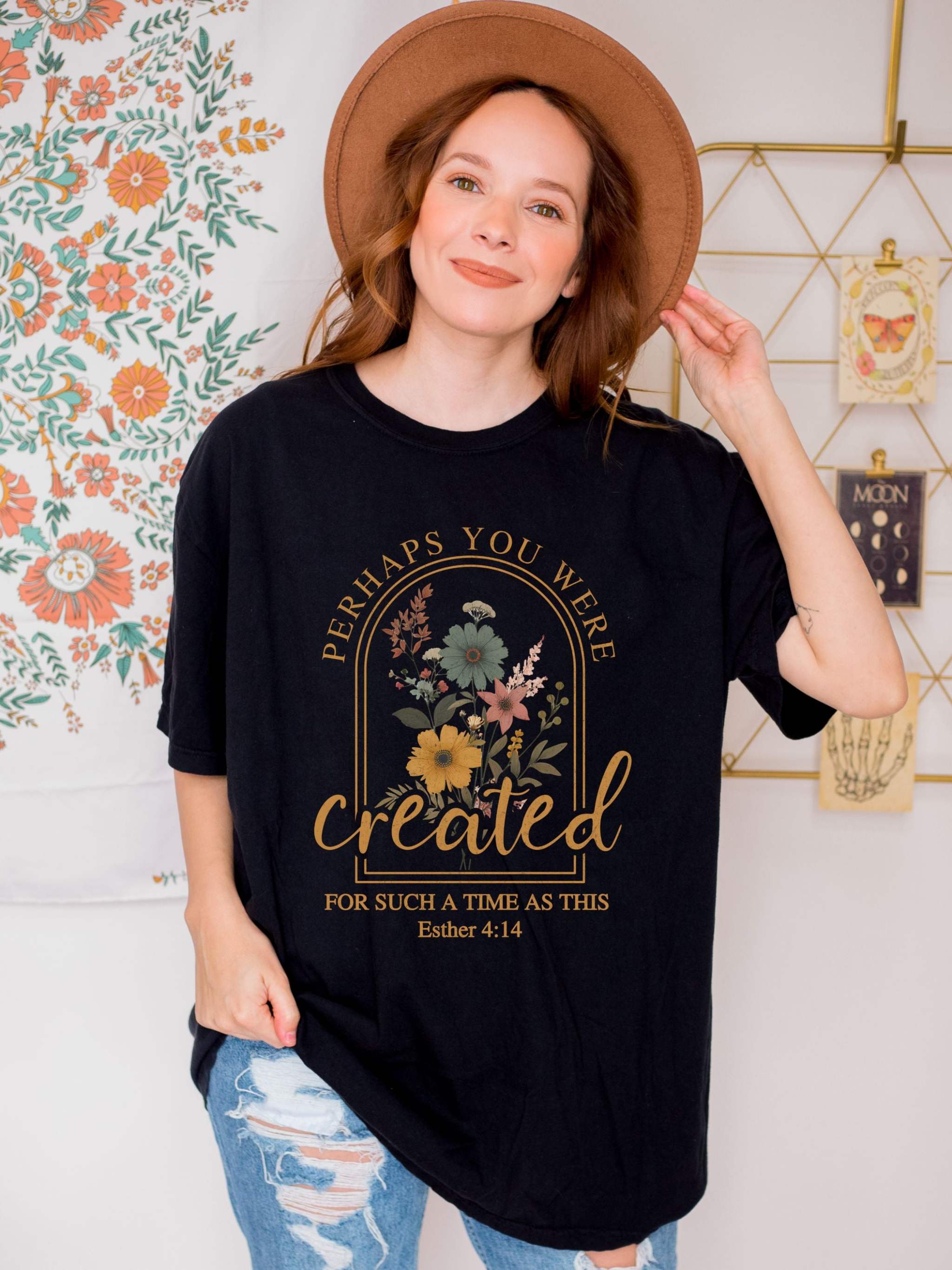 Woman wearing black "Created For Such A Time As This" inspirational faith graphic t-shirt with floral design and verse Esther 4:14
