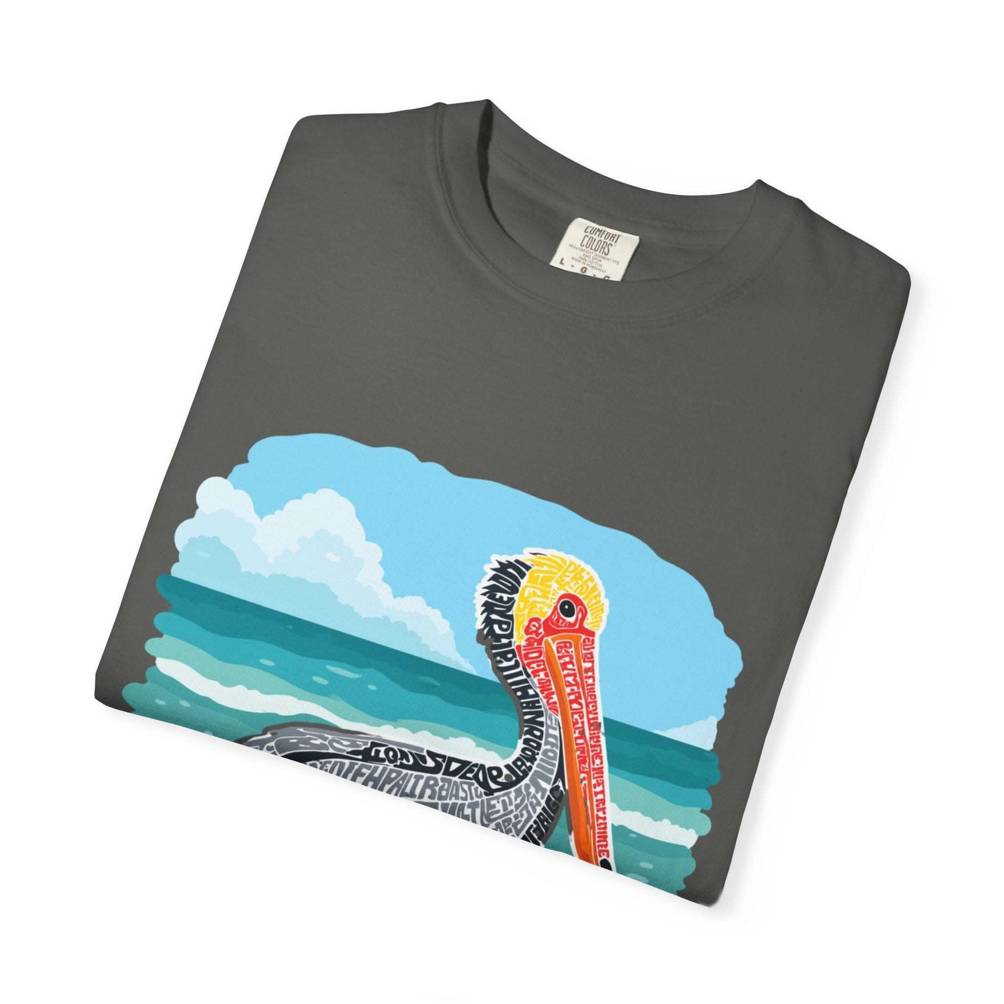 Folded gray t-shirt with a colorful graphic design on a white background