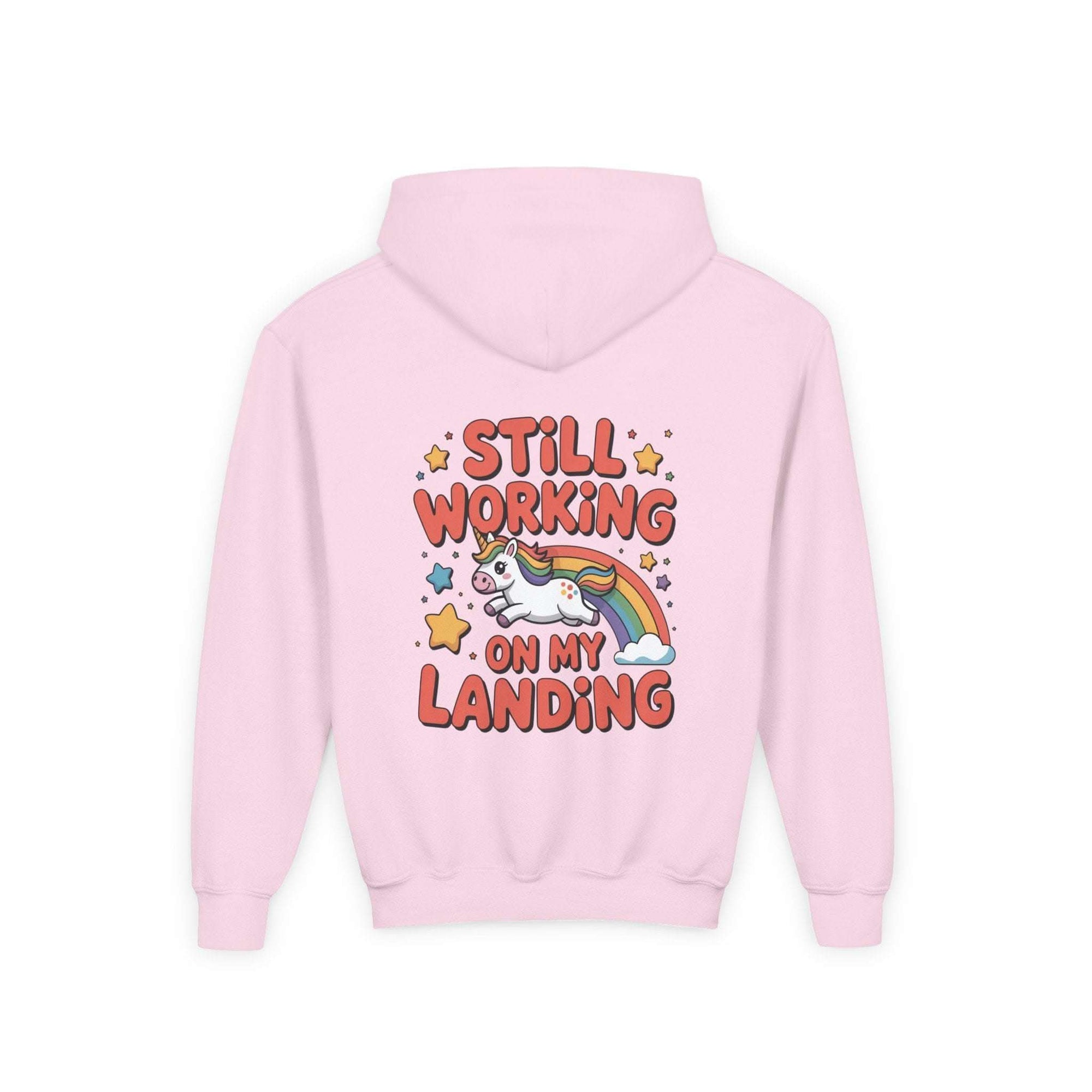 Kids unicorn rainbow design hoodie with playful unicorn and rainbow graphic, soft white fabric, and kangaroo pocket.