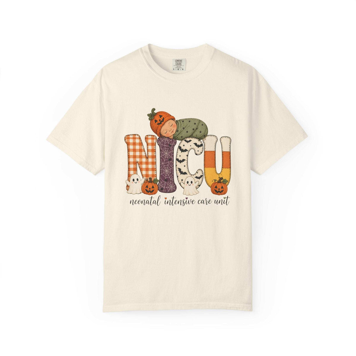 Ivory NICU nurse Halloween T-shirt with patchwork lettering, a sleeping baby in a pumpkin hat, ghosts, and jack-o’-lanterns.
