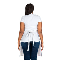Woman wearing a Pastel Coastal Cowgirl apron with tie-back straps, showing the back view.