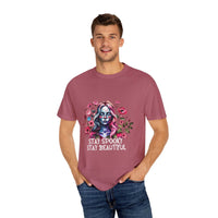 Man wearing soft everyday tee floral skeleton t-shirt with "Stay Spooky Stay Beautiful" design in relaxed fit