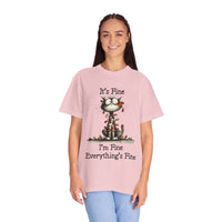 Woman wearing pink cat t-shirt with "It’s Fine, I’m Fine, Everything’s Fine" text and small cat illustration