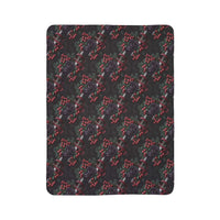 Gothmas black roses and daggers patterned fleece sherpa blanket with plush softness and dark gothic design