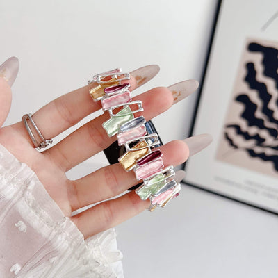 Colorful Dopamine Oil Painting design metal stretch watch band for Apple watches in hand close-up