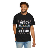 Man wearing black Merry Liftmas Christmas Workout T-shirt with barbell and holiday lights design