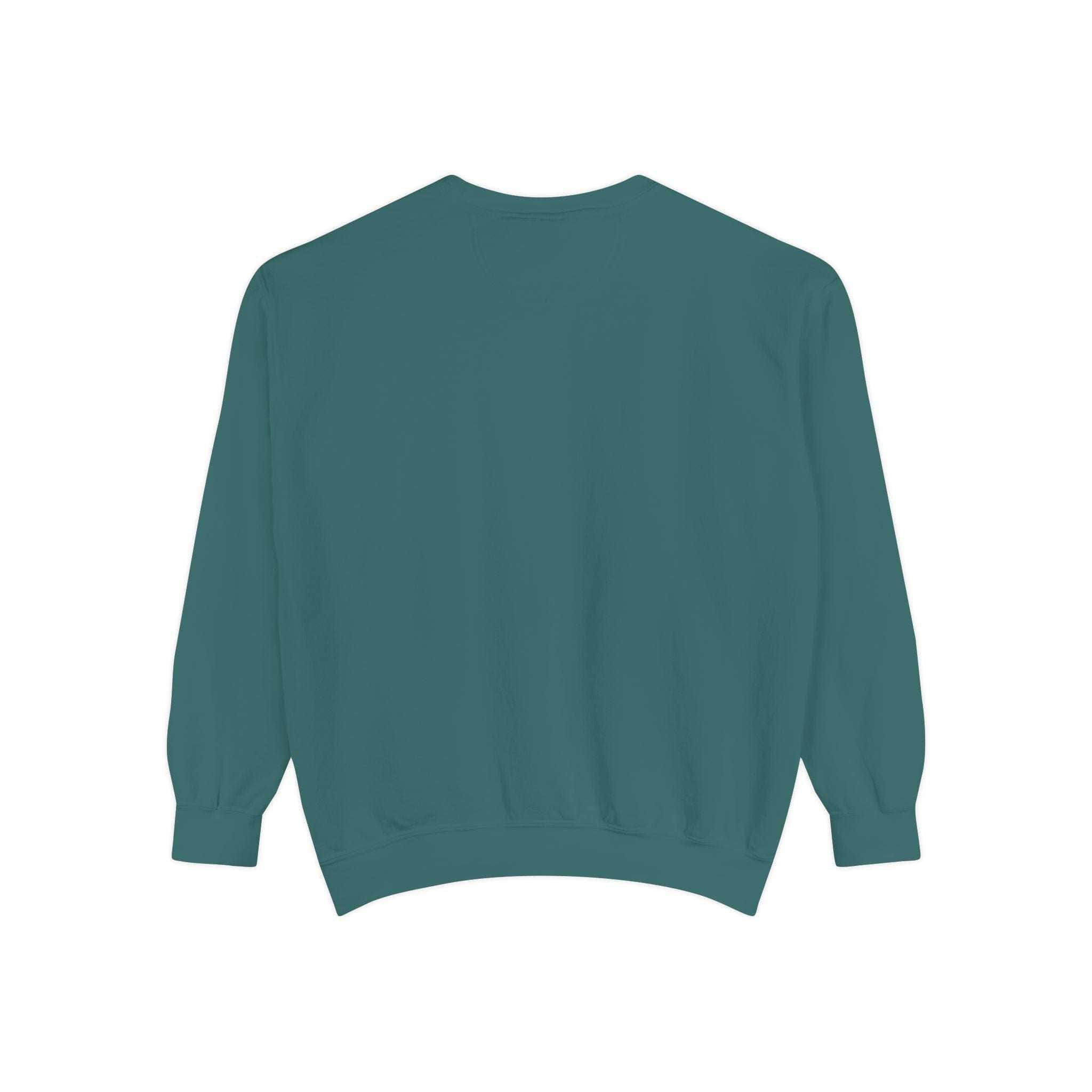 Back view of teal garment-dyed sweatshirt with relaxed fit and ribbed cuffs and waistband