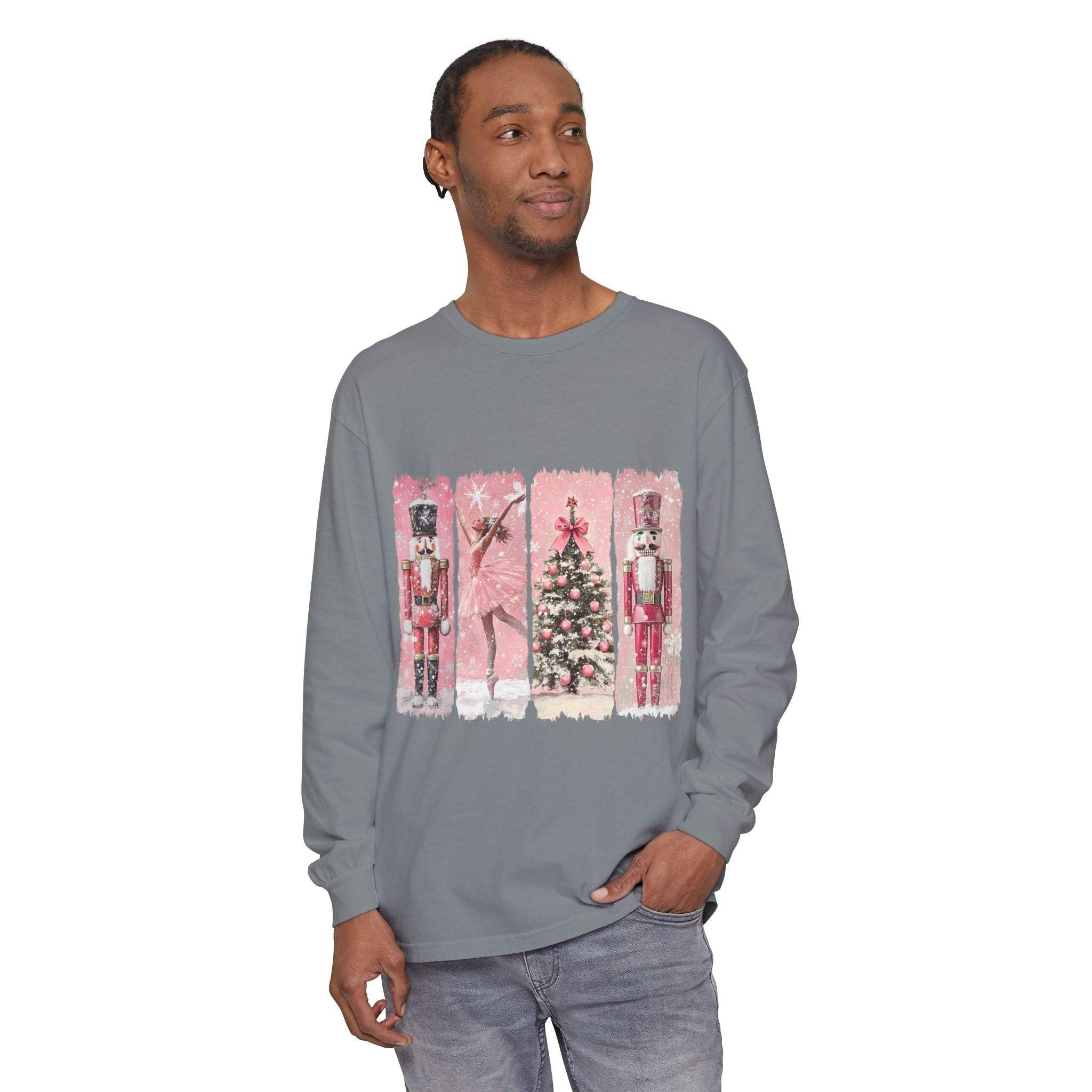 Man wearing gray long sleeve t-shirt with pink watercolor Nutcracker Christmas design