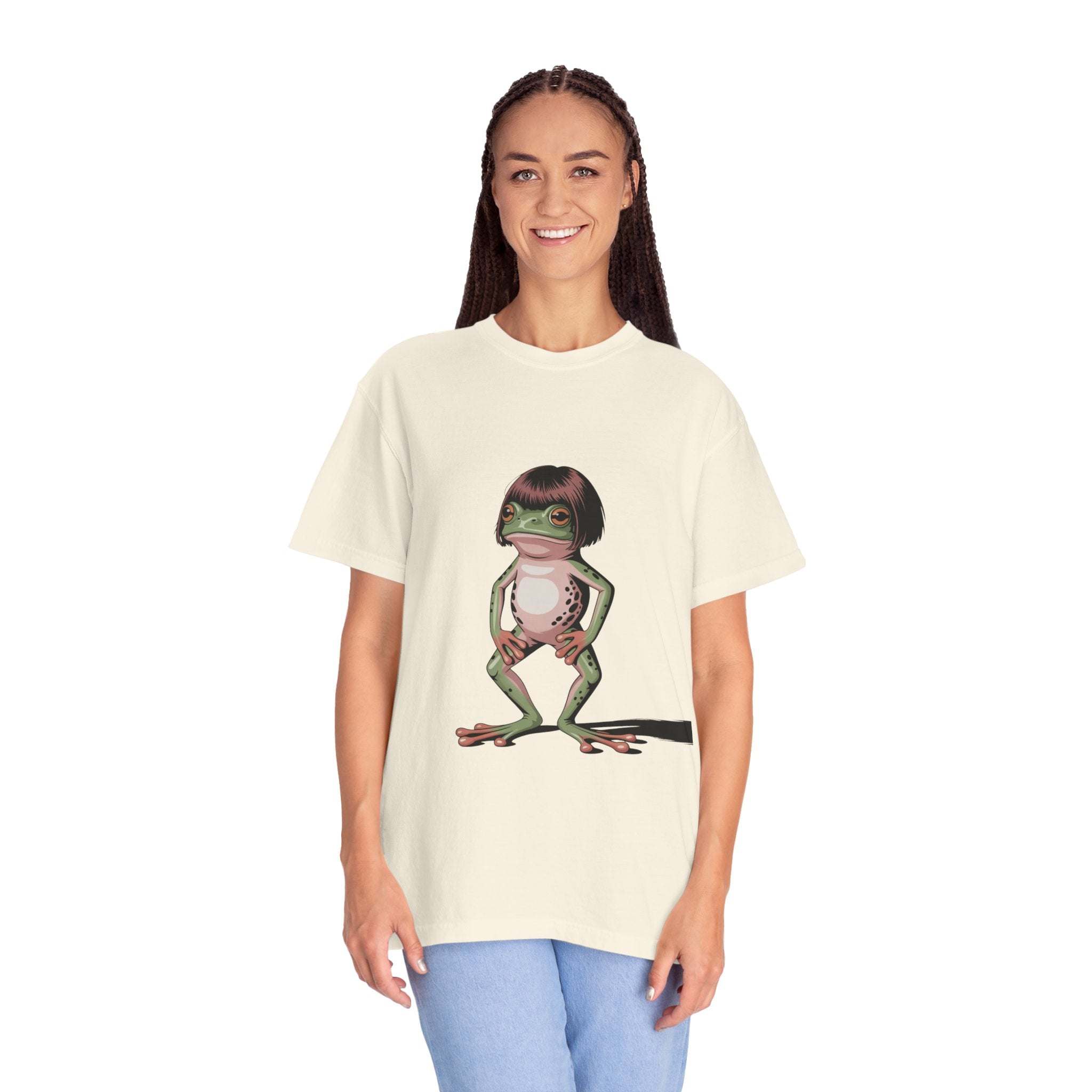 Woman wearing a cream t-shirt with a quirky frog with bob haircut meme graphic on front